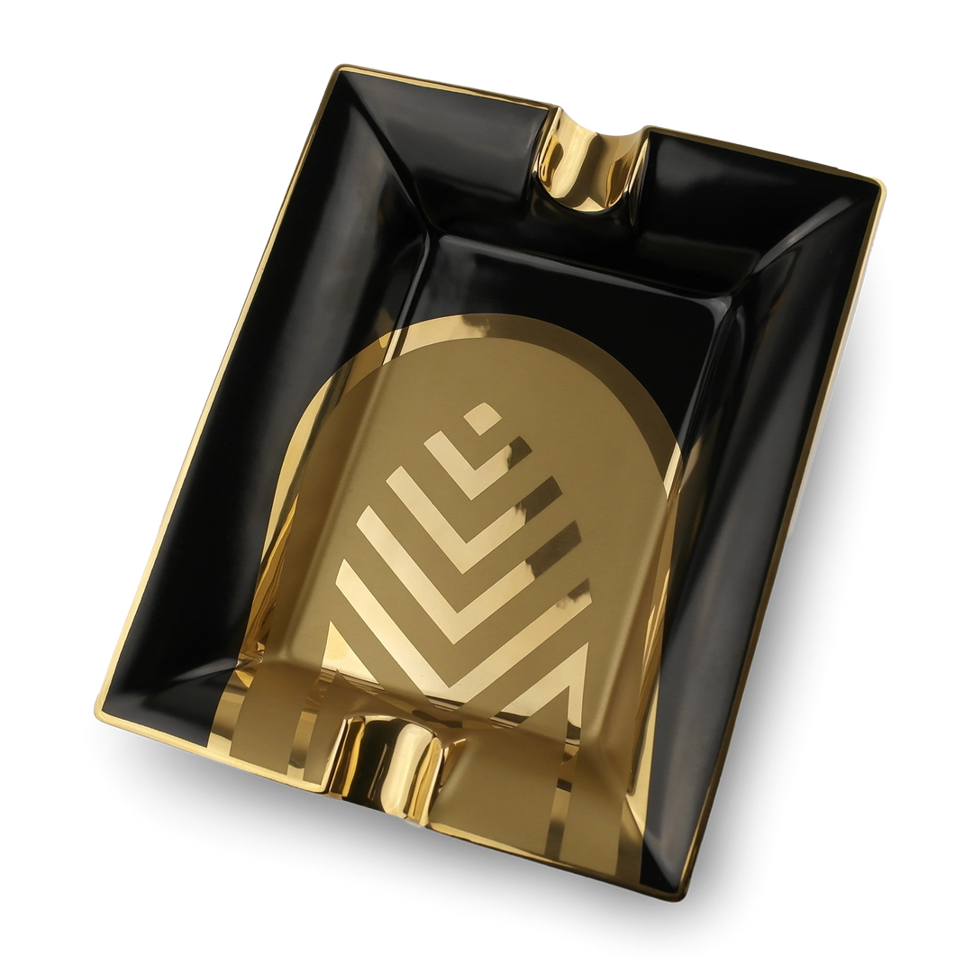 La Casa del Habano porcelain cigar ashtray
Black porcelain ashtray with gold La Casa del Habano logo
Luxury 2 cigar ashtray made from fine porcelain
Premium cigar accessory by La Casa del Habano
Elegant black and gold cigar ashtray