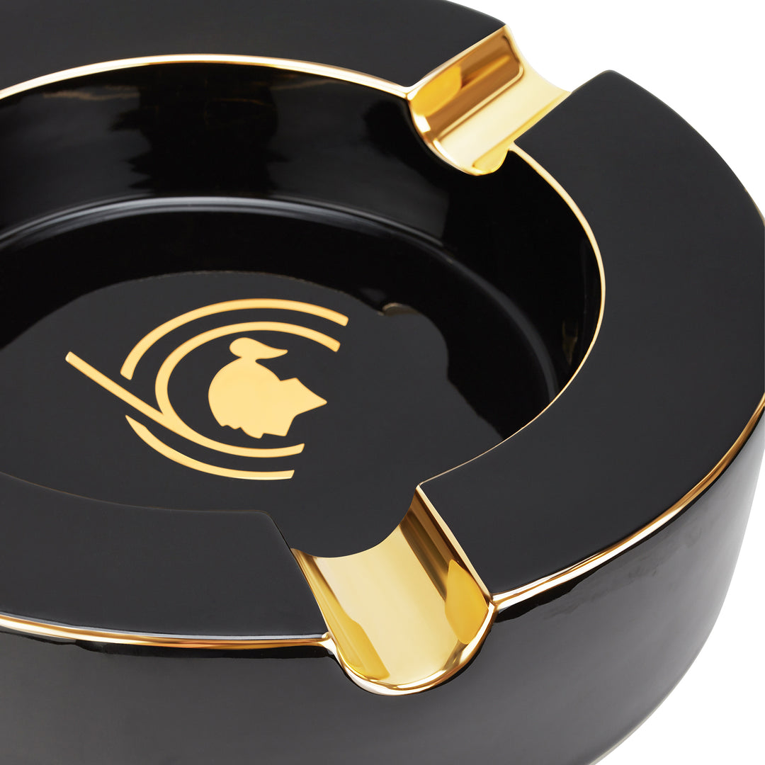 S.T. Dupont Cohiba 60th Anniversary XL Ashtray in black lacquer
Luxury Cohiba cigar ashtray with hand-painted gold finish
S.T. Dupont black and gold XL cigar ashtray
Cohiba 60th anniversary collector ashtray
Premium cigar accessory by S.T. Dupont and Cohiba