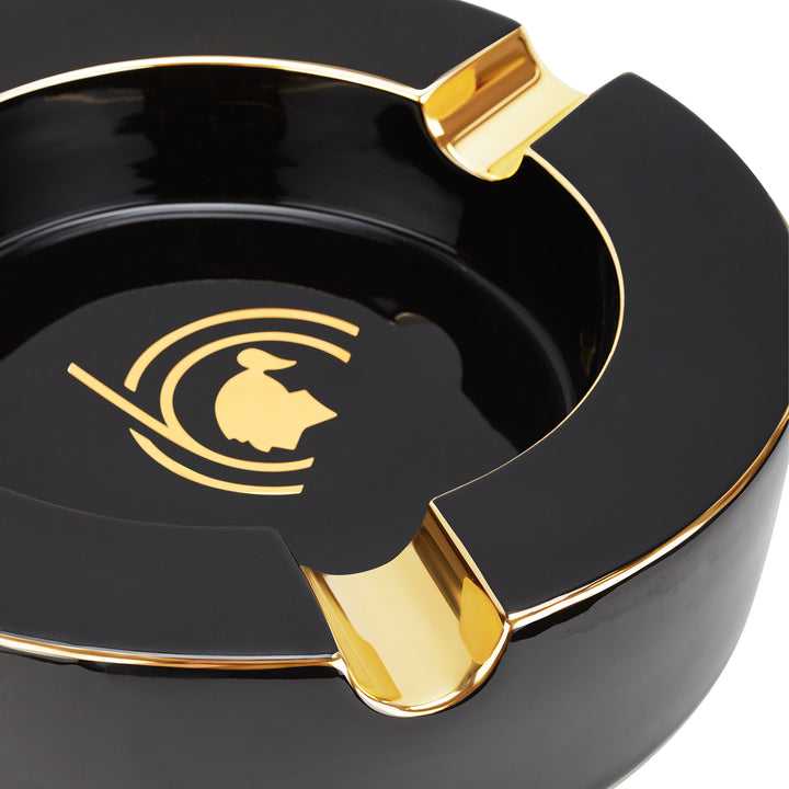 S.T. Dupont Cohiba 60th Anniversary XL Ashtray in black lacquer
Luxury Cohiba cigar ashtray with hand-painted gold finish
S.T. Dupont black and gold XL cigar ashtray
Cohiba 60th anniversary collector ashtray
Premium cigar accessory by S.T. Dupont and Cohiba