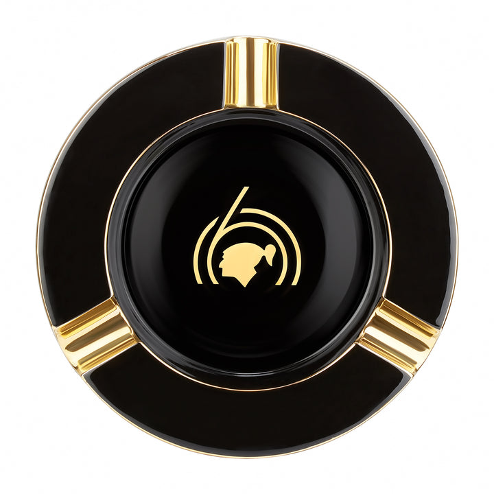 S.T. Dupont Cohiba 60th Anniversary XL Ashtray in black lacquer
Luxury Cohiba cigar ashtray with hand-painted gold finish
S.T. Dupont black and gold XL cigar ashtray
Cohiba 60th anniversary collector ashtray
Premium cigar accessory by S.T. Dupont and Cohiba