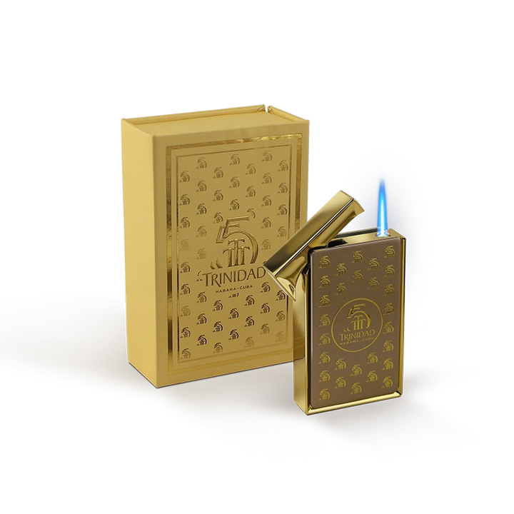 Trinidad 55th Anniversary torch cigar lighter
Premium lighter with gold Trinidad logo
Adjustable single flame cigar lighter
Trinidad anniversary collector lighter
Luxury cigar accessory by Trinidad