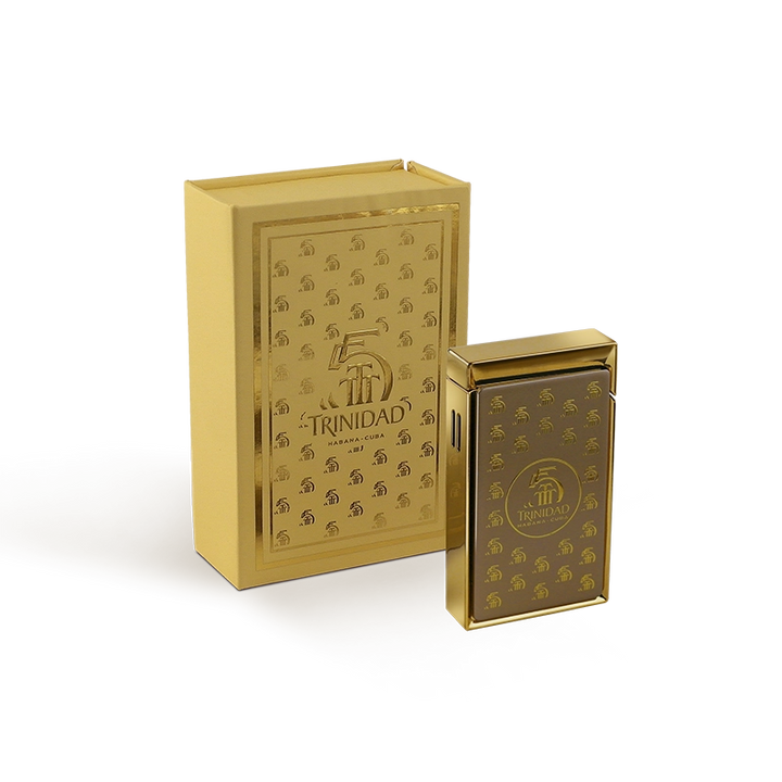 Trinidad 55th Anniversary torch cigar lighter
Premium lighter with gold Trinidad logo
Adjustable single flame cigar lighter
Trinidad anniversary collector lighter
Luxury cigar accessory by Trinidad